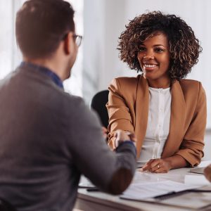 Business people shaking hands after meeting