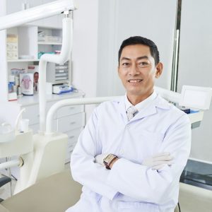 Male dentist in his workspace