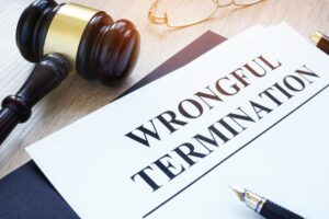 Documents about wrongful termination and gavel.